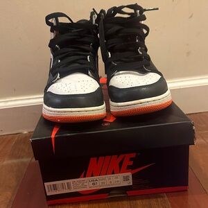 Nike Black and White Sneakers with Orange Accents
